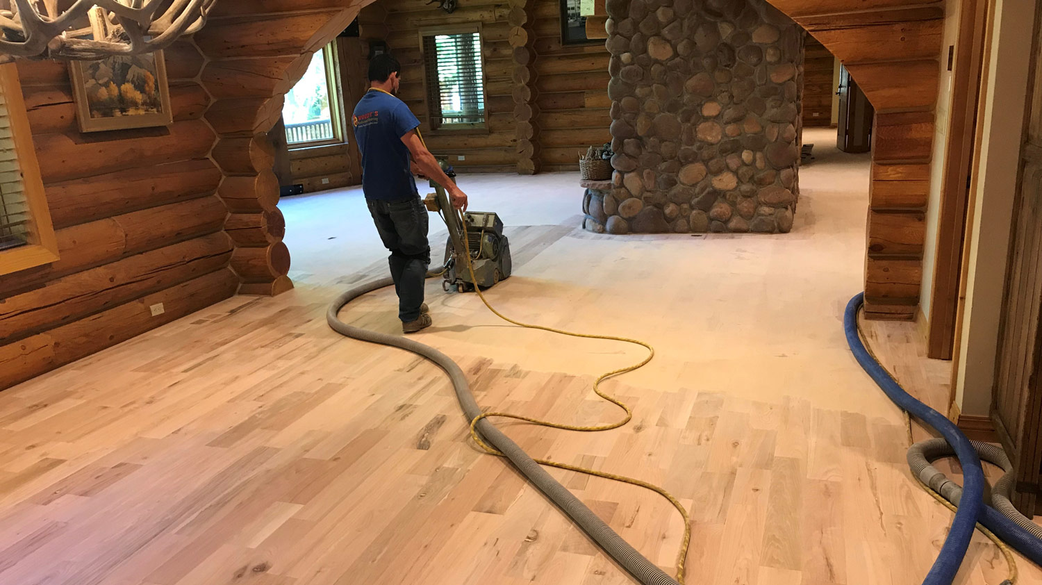A Utah red oak floor refinishing project by Woody's Hardwood Flooring